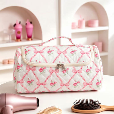 Hanging travel makeup bag with compartments